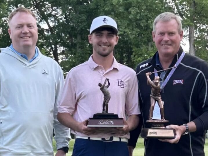 Jack Whaley with the NAIA trophy