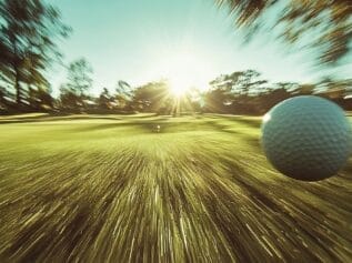 Golf ball travelling at speed