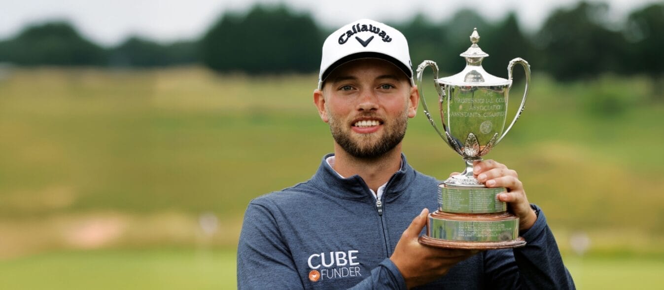 Matty Lamb with the Coca-Cola PGA Assistants’ Championship trophy (© The PGA, John Phillip, Getty Images)