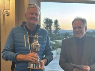 Richard Wheatley with the YOOM trophy