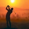 Golfer sunset