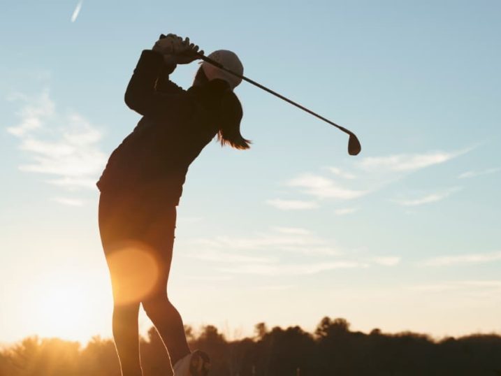 Golfer at sunset