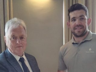 Hadrian Golf League chairman Steve Rooney with LWC Drinks account manager Matty Oxley