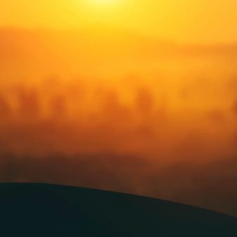 Golfer at sunset
