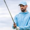 Golfer in PING hoodie