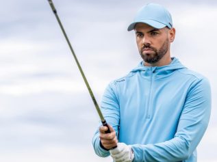 Golfer in PING hoodie