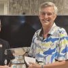 Gary Catt (right) receiving the trophy from YUGC president Bruce Light