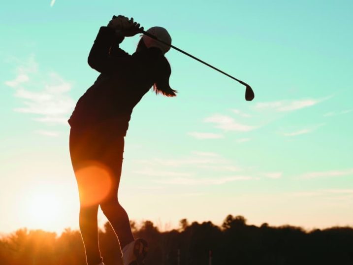 Golfer sunset