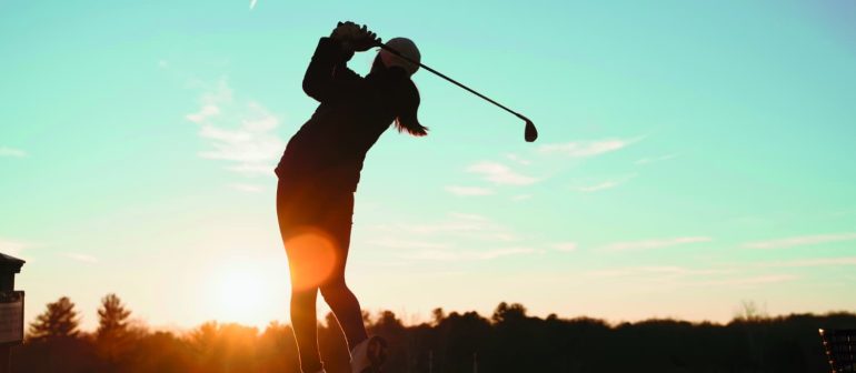 Golfer sunset