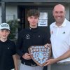 Myles and Hugo Bowey-Taylor receiving the trophy from NUGC executive member Michael Wilson